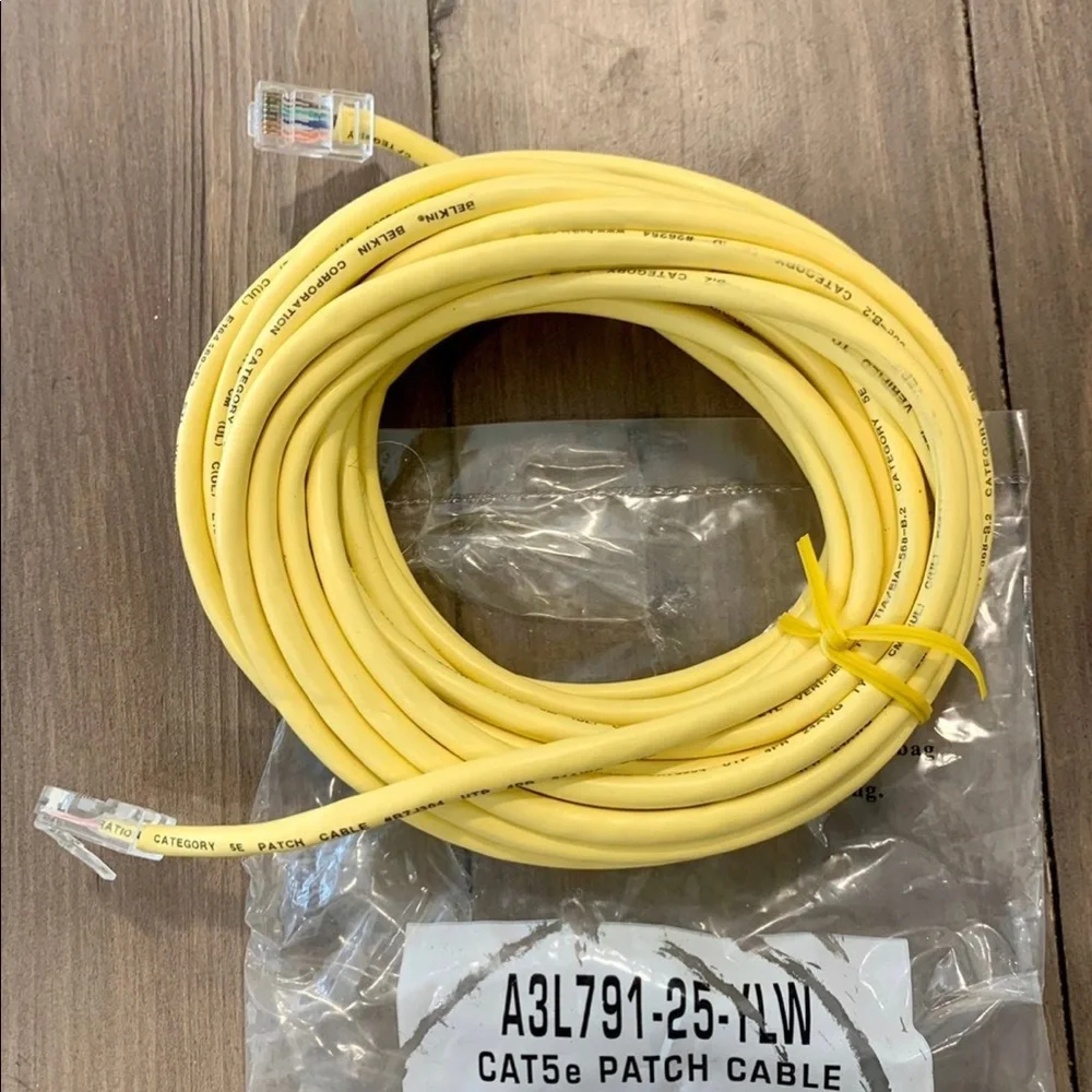 Computer extension cord. Belkin, 25 ft yellow cat5e patch cable cord.